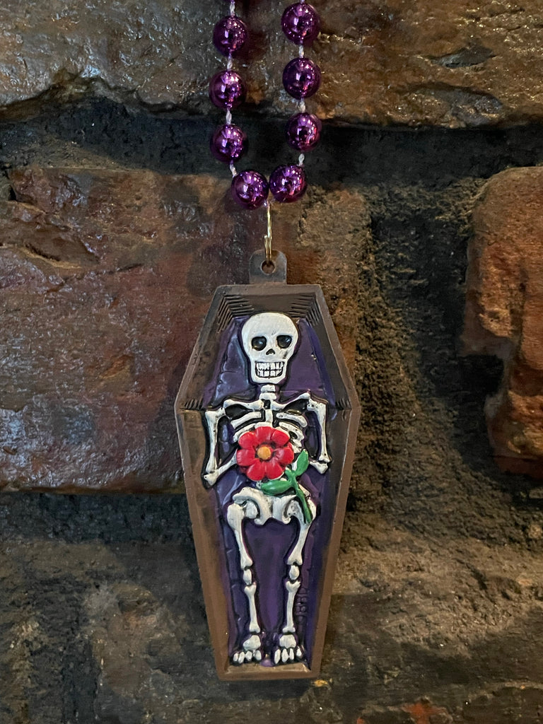 Mardi Gras coffin beads